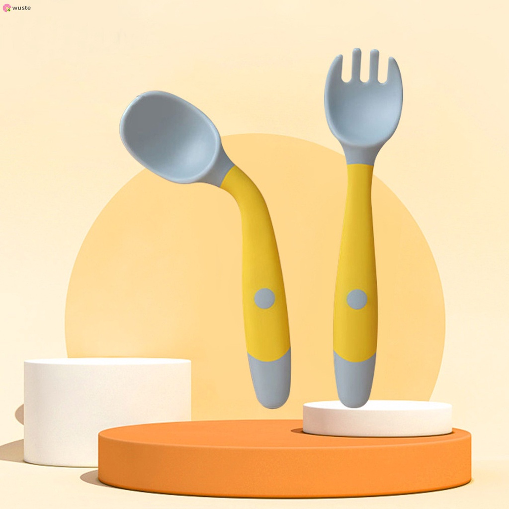 Ensemble cuillère et fourchette en silicone de qualité alimentaireEnsemble cuillère et fourchette en silicone de qualité alimentaireCuillère et fourchette dexercice auto-alimentantes pour bébé